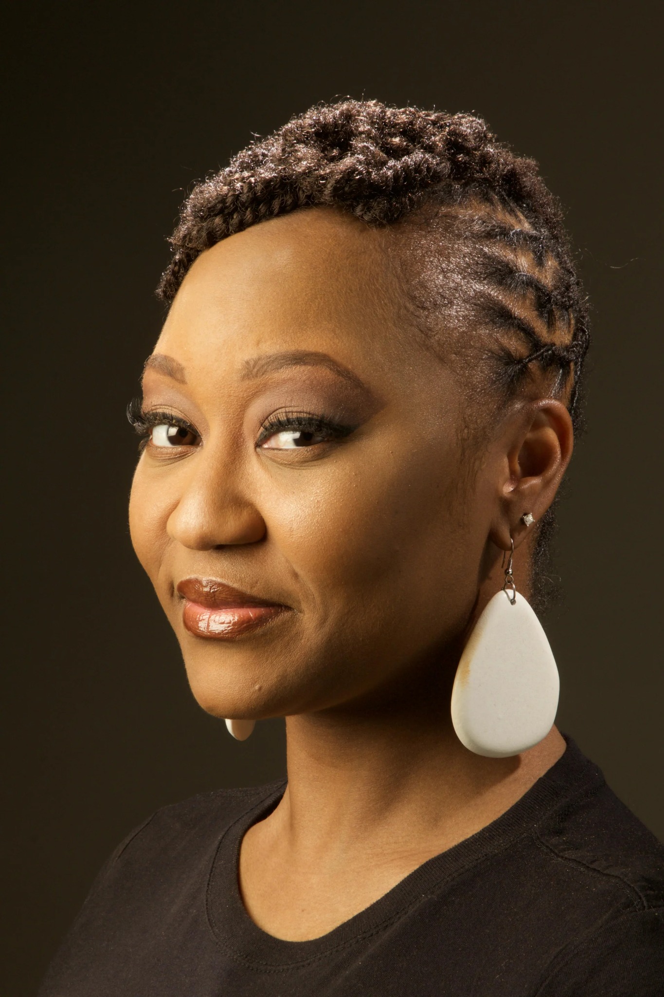Flat twists arranged into a sculpted custom style